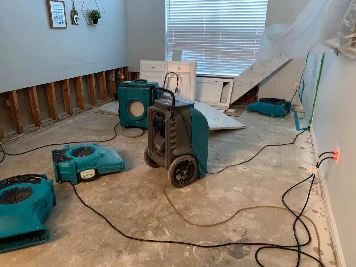 Dehumidifier in flood-cut room for Water Damage Restoration in Osprey